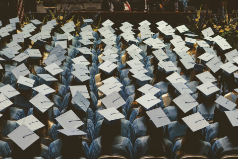A group of students in black graduation caps